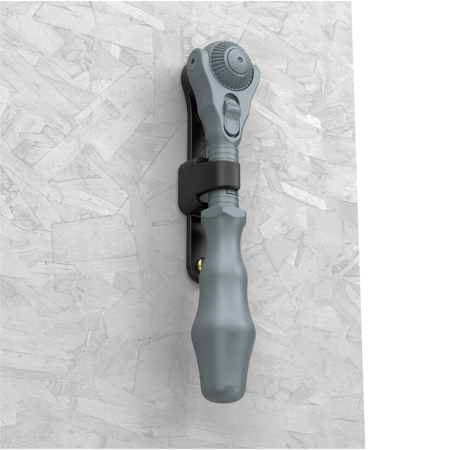 Wera Tool Rebel Zyklop Speed Knarre 1/4 Zoll Halterung mit ausgegrautem Zyklop Speed in der Halterung an einer Wand